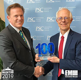 Jim Garrettson, CEO of Executive Mosaic, Presents David Berteau, President and CEO of PSC, His Second Wash100 Award
