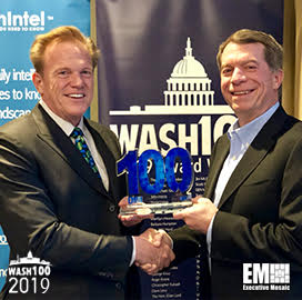 Jim Garrettson, CEO of Executive Mosaic, Presents George Wilson, President and CEO of ECS Federal, His Second Wash100 Award