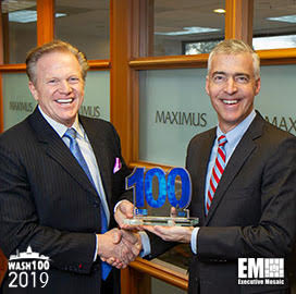 Jim Garrettson, CEO of Executive Mosaic, Presents Bruce Caswell His First Wash100 Award