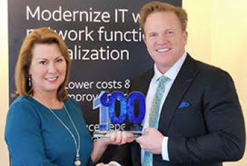 Jim Garrettson, CEO of Executive Mosaic, Presents Jill Singer, National Security VP for AT&T, Her Fourth Wash100 Award