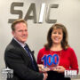 Jim Garrettson, CEO of Executive Mosaic, Presents Nazzic Keene, COO of SAIC, Her Second Wash100 Award
