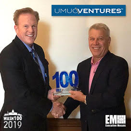 Jim Garrettson, CEO of Executive Mosaic, Presents Mark Gerencser, Chairman of UMUC’s Board of Directors, His Third Wash100 Award