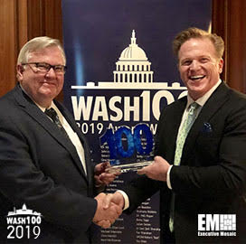 Jim Garrettson, CEO of Executive Mosaic, Presents Richard White, President of SSL Government Systems, His First Wash100 Award