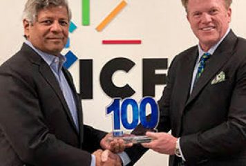 Jim Garrettson, CEO of Executive Mosaic, Presents Sudhakar Kesavan, Chairman and CEO of ICF, His Second Wash100 Award
