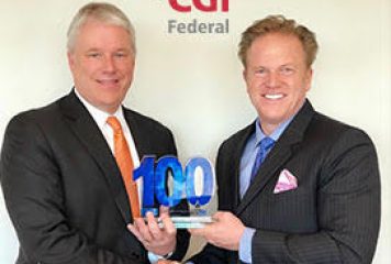 Jim Garrettson, CEO of Executive Mosaic, Presents Tim Hurlebaus, President of CGI Federal, His Second Wash100 Award