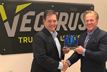 Jim Garrettson, CEO of Executive Mosaic, Presents Chuck Prow, President and CEO of Vectrus, His Fifth Wash100 Award