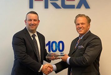 Seth Moore, CEO of T-Rex Solutions, Receives First Wash100 Award From Jim Garrettson, CEO of Executive Mosaic
