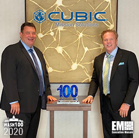 Jim Garrettson, CEO of Executive Mosaic, Presents Mike Twyman, President of Cubic Mission Solutions, His First Wash100 Award
