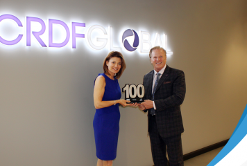 Executive Mosaic CEO Jim Garrettson Presents 2022 Wash100 Award to Tina Dolph, Chief Global Officer With CRDF Global