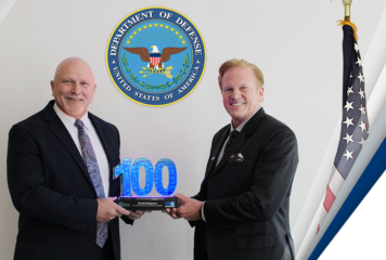 DOD’s David McKeown Accepts 2023 Wash100 Award From Executive Mosaic’s Jim Garrettson
