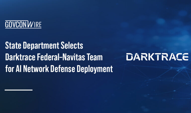 Darktrace logo. The State Department awarded Darktrace and Navitas a contract to deploy AI-powered NDR.