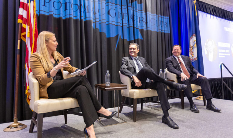 Carrie Wibben Kaupp, Emil Michael and Michael Duffey. Exiger leader moderates fireside chat between two Pentagon officials