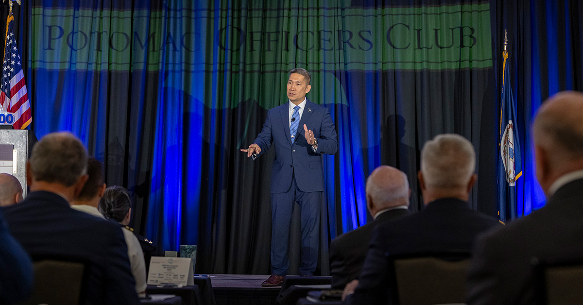 Hung Cao, acting Navy secretary and 2026 Wash100 popular vote winner, encourages industry at the 2026 Navy Summit to help the Navy deliver weapon systems faster. Photo: POC. Hung Cao. Acting Navy Secretary Hung Cao speaks at the 2026 Navy Summit.