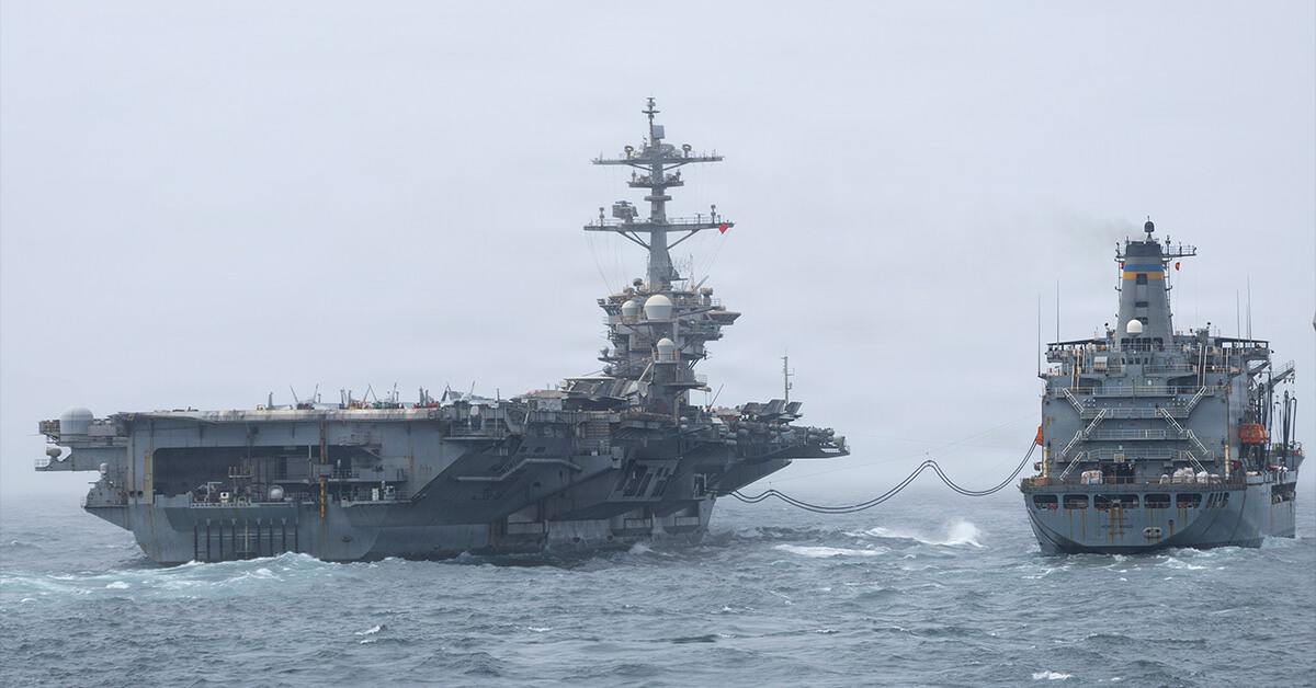 USS Abraham Lincoln (right) and fleet replenishment oiler USNS Henry J. Kaiser conduct replenishment at sea. Iran used AI-generated images of USS Abraham Lincoln in its disinformation campaign in March. Photo: U.S. Navy USS Abraham Lincoln. The ship was the subject of several Iranian AI-generated disinformation content